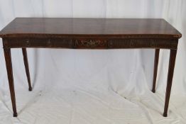 Large mahogany serpentine front serving table decorated with Adam style urn and carved detail raised