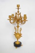 Gilt brass candelabra with four sconces and central sconce modelled in classical style, 43cm high