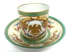 Sevres style 19th century cup and saucer, the cup with Napoleonic emblem eagle, the saucer with a '