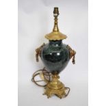 Gilt brass table lamp with onyx decoration, 50cm high