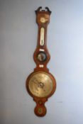 19th century mahogany cased barometer with broken arch pediment over a body with damp/dry meter,