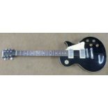 A modern copy of a LES PAUL GIBSON electric guitar, serial number 51691, made in the USA. Nice