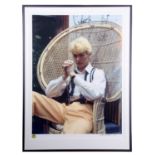 DAVID BOWIE David sat on a wicker chair. Measures 37 by 27”. Denis O’Regan is an English