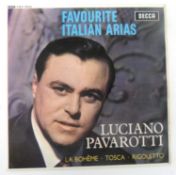 LUCIANO PAVAROTTI A signed 7” single with the words ‘From Luciano to Miss Ward with Love, 1965’.