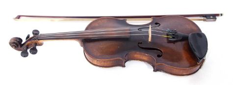 An antique violin, cased with bow. Inside dated 1791 in ink, name illegible. With restoration.