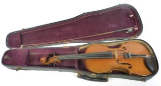A violin, maker unknown in a hard case with bow.