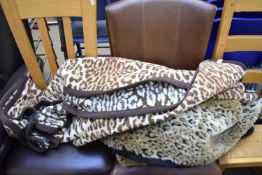 TWO LEOPARD PRINT BLANKETS