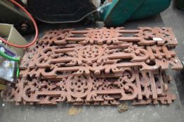 QUANTITY OF RED PAINTED VICTORIAN IRON DECORATIVE RAILINGS