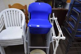 SIX PLASTIC STACKING CHAIRS