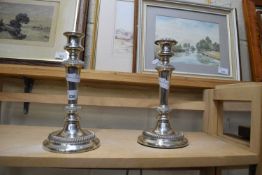 TWO PLATED CANDLESTICKS