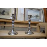 TWO PLATED CANDLESTICKS