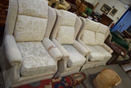 BEIGE FLORAL UPHOLSTERED TWO-SEATER SOFA AND PAIR OF ARMCHAIRS