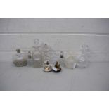 MIXED LOT VARIOUS CUT GLASS AND CERAMIC PERFUME BOTTLES INCLUDING SOME WITH SILVER COLLARS