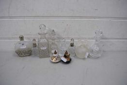 MIXED LOT VARIOUS CUT GLASS AND CERAMIC PERFUME BOTTLES INCLUDING SOME WITH SILVER COLLARS