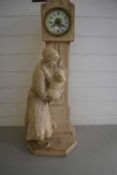 UNUSUAL CONTINENTAL CLOCK FORMED AS A MOTHER AND CHILD LOOKING UP AT A LONGCASE CLOCK, CERAMIC CASE,