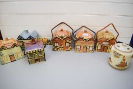 MIXED LOT COLLECTION VARIOUS PRICE AND OTHER COTTAGE FORMED BISCUIT BARRELS, COTTAGE FORMED