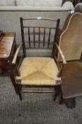 19TH CENTURY SPINDLE BACK AND RUSH SEATED CARVER CHAIR