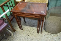 NEST OF THREE MAHOGANY VENEERED TABLES