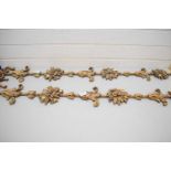 PAIR OF MODERN COMPOSITION WALL DECORATIONS FORMED AS RIBBONS, FLOWERS AND LEAVES
