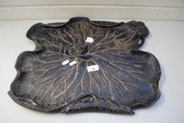 EARLY 20TH CENTURY EBONISED WOODEN SERVING TRAY FORMED AS A LOTUS LEAF AND FLOWER