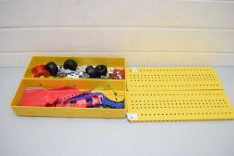 YELLOW METAL CASE CONTAINING VARIOUS MECCANO PARTS AND INSTRUCTIONS MARKED 'MECCANO M.O'
