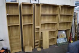 SUITE OF FIVE VARIOUS LIGHT WOOD FINISH MODERN BOOKCASES, VARIOUS WIDTHS