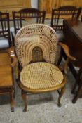 EARLY 20TH CENTURY CANE SEATED AND BACKED ARMCHAIR