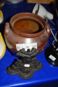 CAST IRON DOOR STOP AND A BROWN GLAZED STONEWARE POT