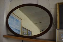 EARLY 20TH CENTURY OVAL BEVELLED WALL MIRROR, 82CM WIDE