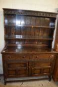 LATE 19TH/EARLY 20TH CENTURY OAK DRESSER WITH SHELVED BACK AND A BASE WITH TWO DOORS AND TWO