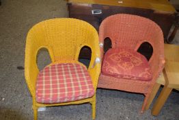 TWO PAINTED WICKERWORK CHAIRS WITH CUSHIONS