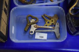 BOX OF MIXED METAL CLOCK KEYS