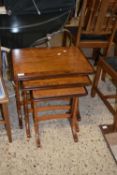 REPRODUCTION BURR WALNUT NEST OF THREE TABLES