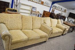 FLORAL UPHOLSTERED THREE SEATER SOFA, TWO SEATER SOFA AND AN ARMCHAIR
