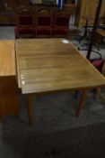 RETRO MID-CENTURY ROSEWOOD EXTENDING DINING TABLE WITH PULL OUT CENTRE LEAF, MADE AND DESIGNED BY