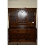 20TH CENTURY STAINED OAK FINISH SIDEBOARD WITH ASTRAGAL GLAZED DISPLAY CABINET ABOVE, WIDTH APPROX