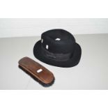 BLACK LEATHER HOMBURG HAT BY G A DUNN & CO, PICCADILLY CIRCUS, TOGETHER WITH A HAIR BRUSH