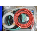 LARGE PLASTIC BOX OF HOSES AND WASHING MACHINE SPARES