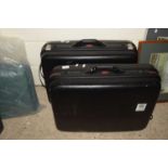 TWO MOULDED SUITCASES