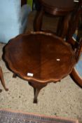 REPRODUCTION MAHOGANY EFFECT SCALLOP EDGE TABLE WITH BALL AND CLAW FEET, APPROX 64CM DIAM