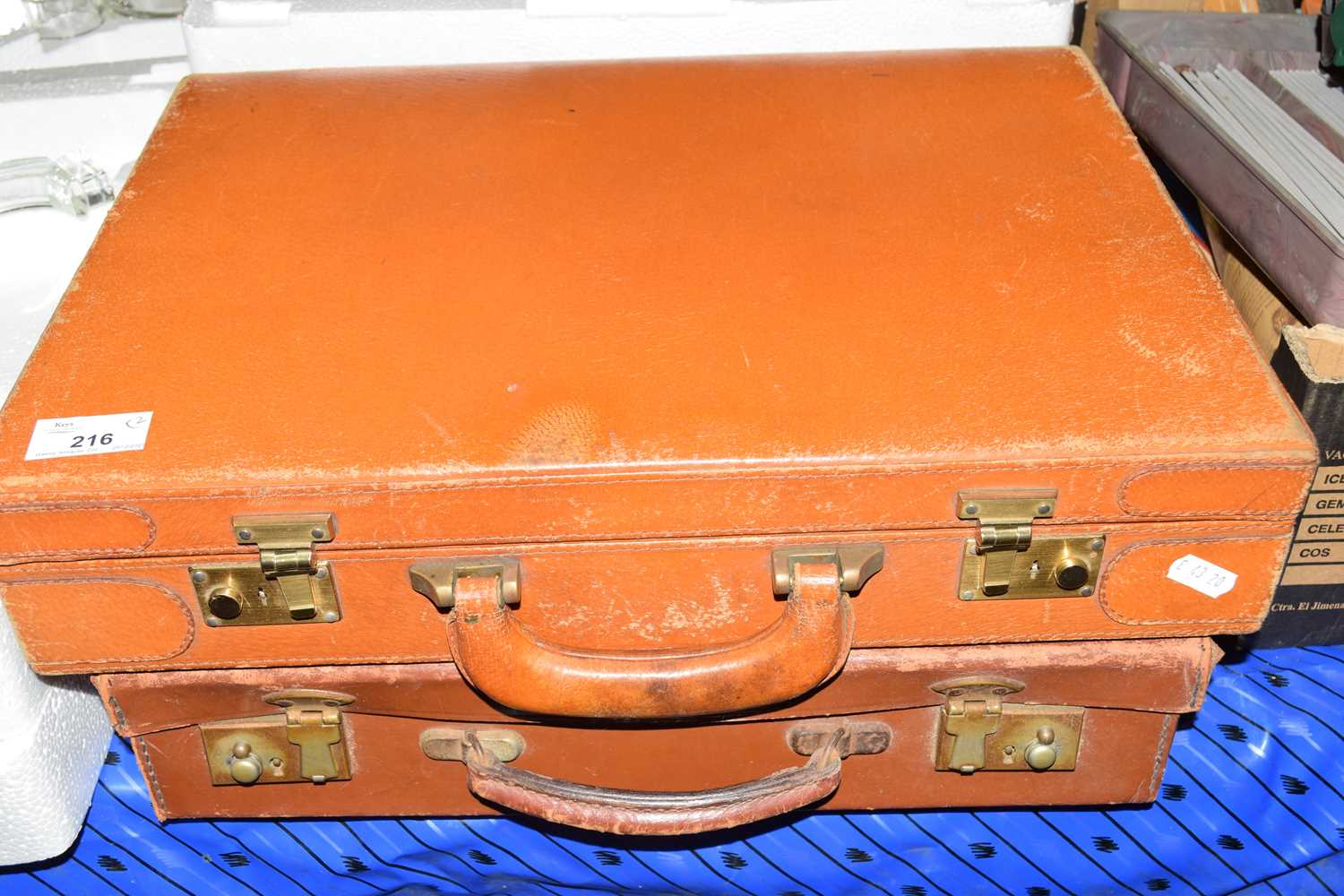 TWO LEATHER SUITCASES