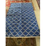 Modern blue rug with white geometric pattern, 278 x 178 cm (condition good)