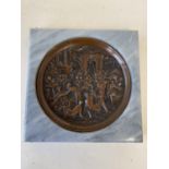 Circular relief bronze plate, 17cm D, depicting the Grand Tour, mounted within a marble plaque