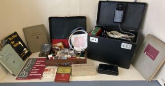 Vintage Singer small electric Sewing machine in case, and a quantity of sewing items and books