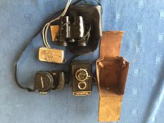 Photographic: Olympus SP-570UZ 35mm camera, pair Nikon 9x25 binoculars, an Olympus digital 600