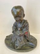 Chinese hollow bronze kneeling child holding a baby, 30cm H (condition good)