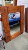 Modern mirror, set within a heavy oak rustic frame, 104 x 133cm