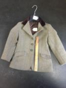 Good quality child's hacking jacket/tweed jacket, with green embossed fox mask buttons, approx. size