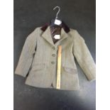 Good quality child's hacking jacket/tweed jacket, with green embossed fox mask buttons, approx. size