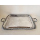 Large heavy gauge hallmarked silver 2 handled tray 49 ozt. The face engraved. The underside